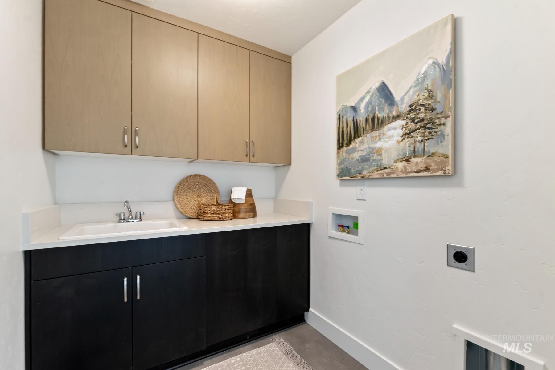 1319 West Malbar Street Meridian, ID 83646 - Photo 30 of 31 Washroom featuring cabinet space, washer hookup, and electric dryer hookup