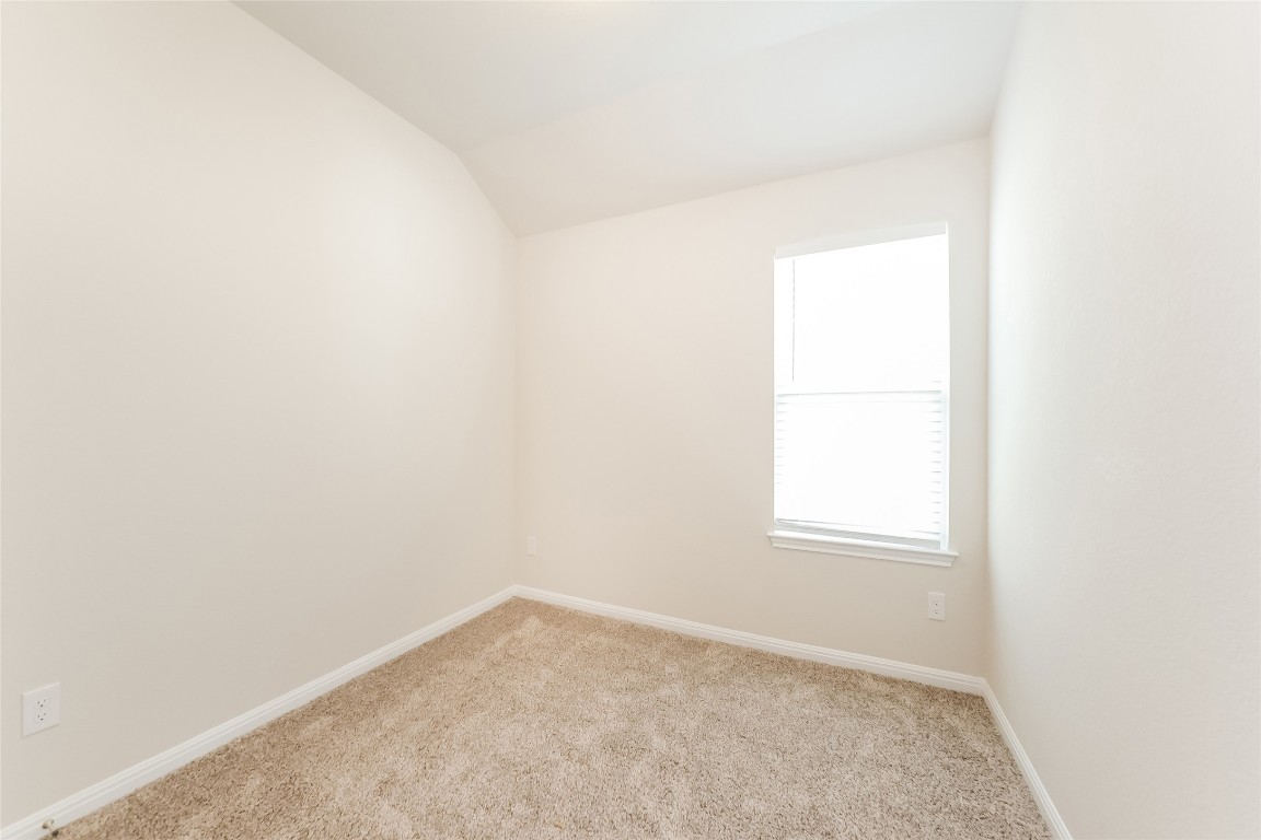 1021 Round Bale Road Hutto, TX 78634 - Photo 11 of 16 an empty room with a window