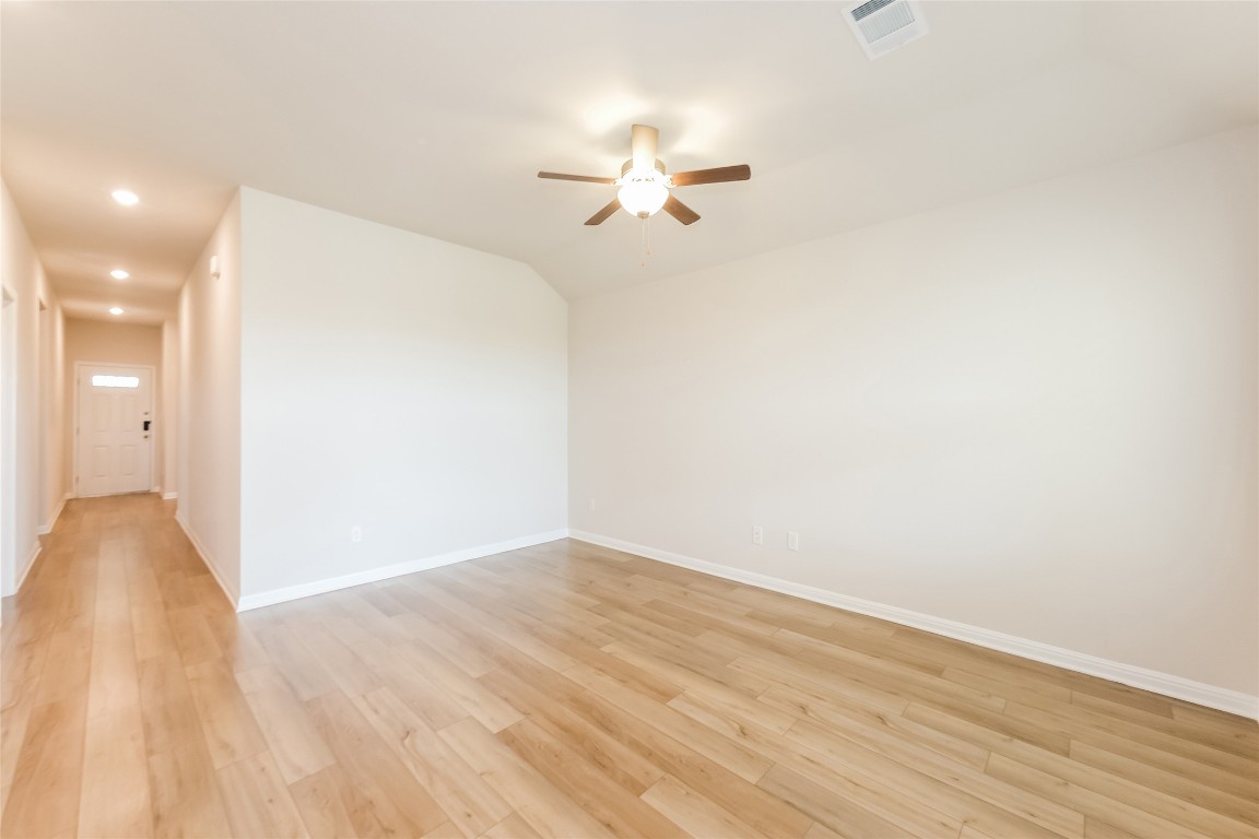 1021 Round Bale Road Hutto, TX 78634 - Photo 3 of 16 a view of empty room with wooden floor
