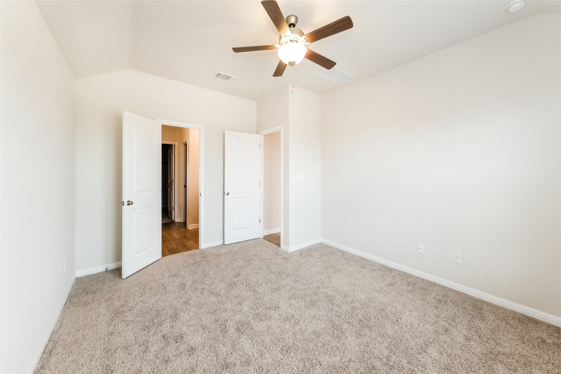 1021 Round Bale Road Hutto, TX 78634 - Photo 9 of 16 a view of a big room with carpet