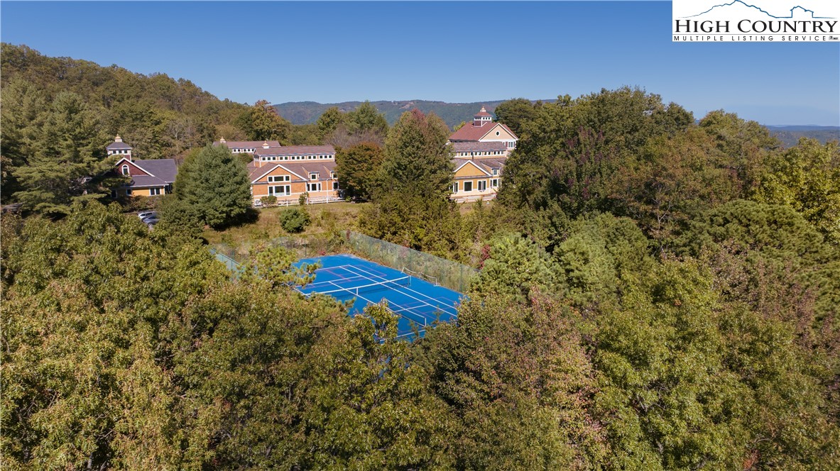195 The Courtyard Boone, NC 28607 - Photo 11 of 16 a view of a house with a yard
