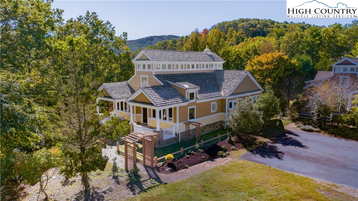 195 The Courtyard Boone, NC 28607 - Photo 2 of 16 a aerial view of a house