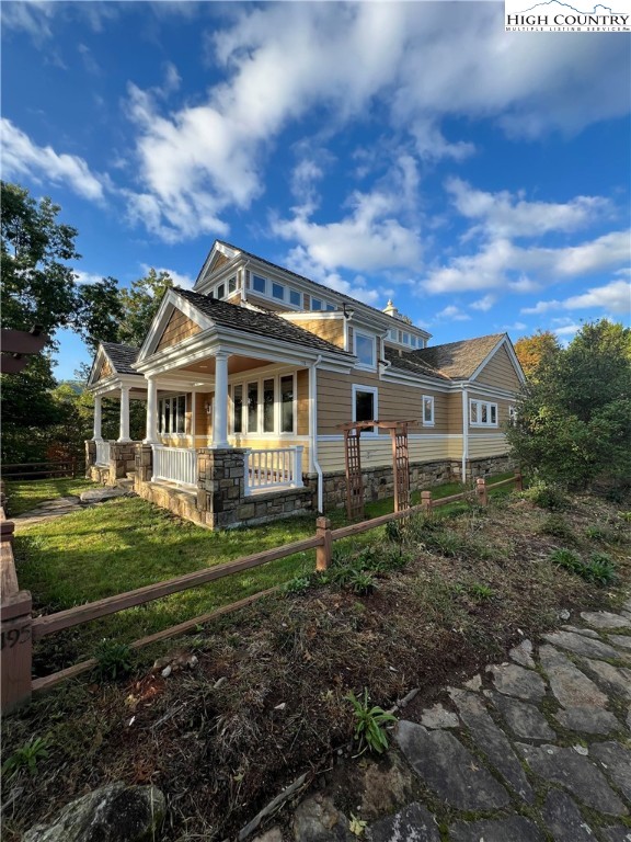 195 The Courtyard Boone, NC 28607 - Photo 5 of 16 a view of a house with a yard