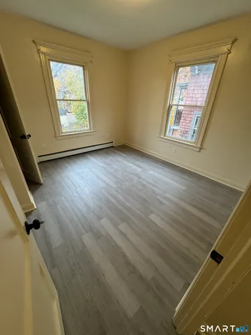 an empty room with windows