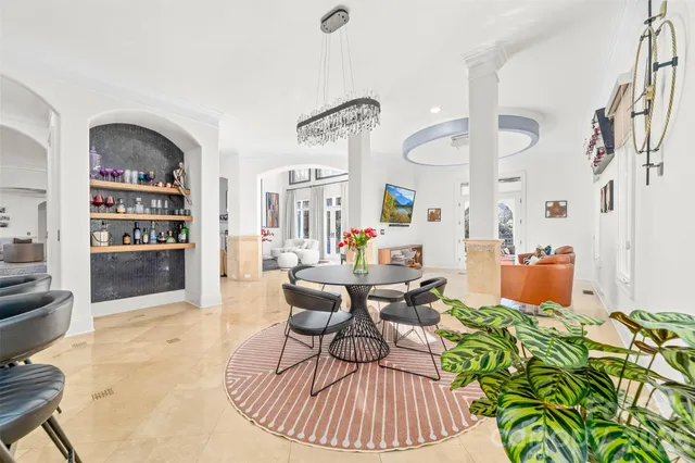 a reading room with furniture and wooden floor
