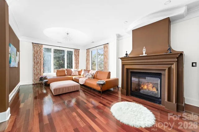 a spacious bathroom with a toilet sink and mirror