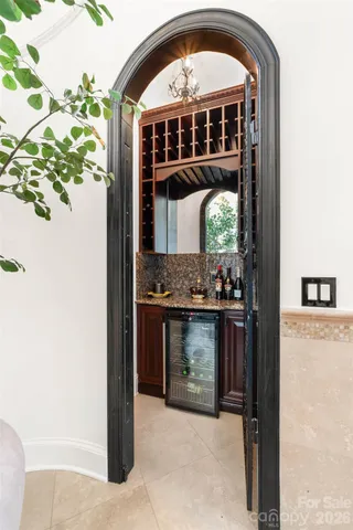 a living room with furniture a window and a fireplace