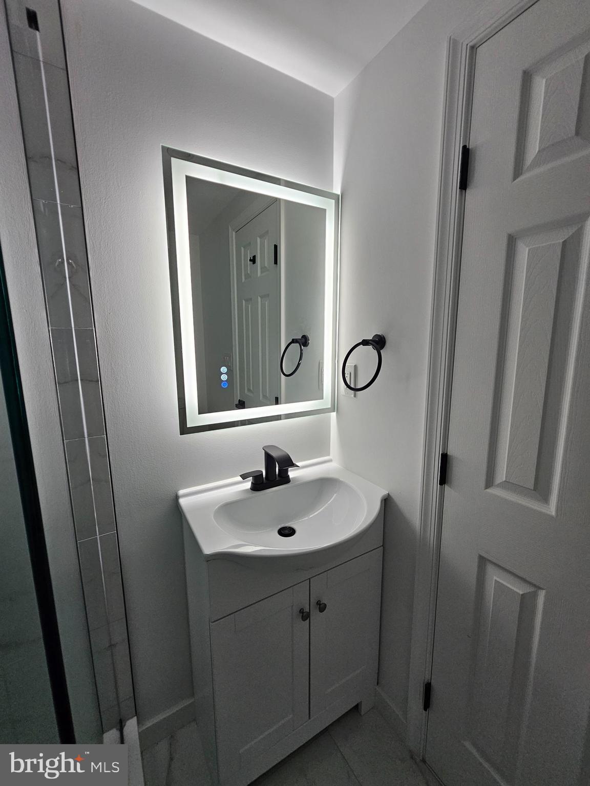 12913 Layhill Road Silver Spring, MD 20906 - Photo 36 of 49 3rd, Basement full bath