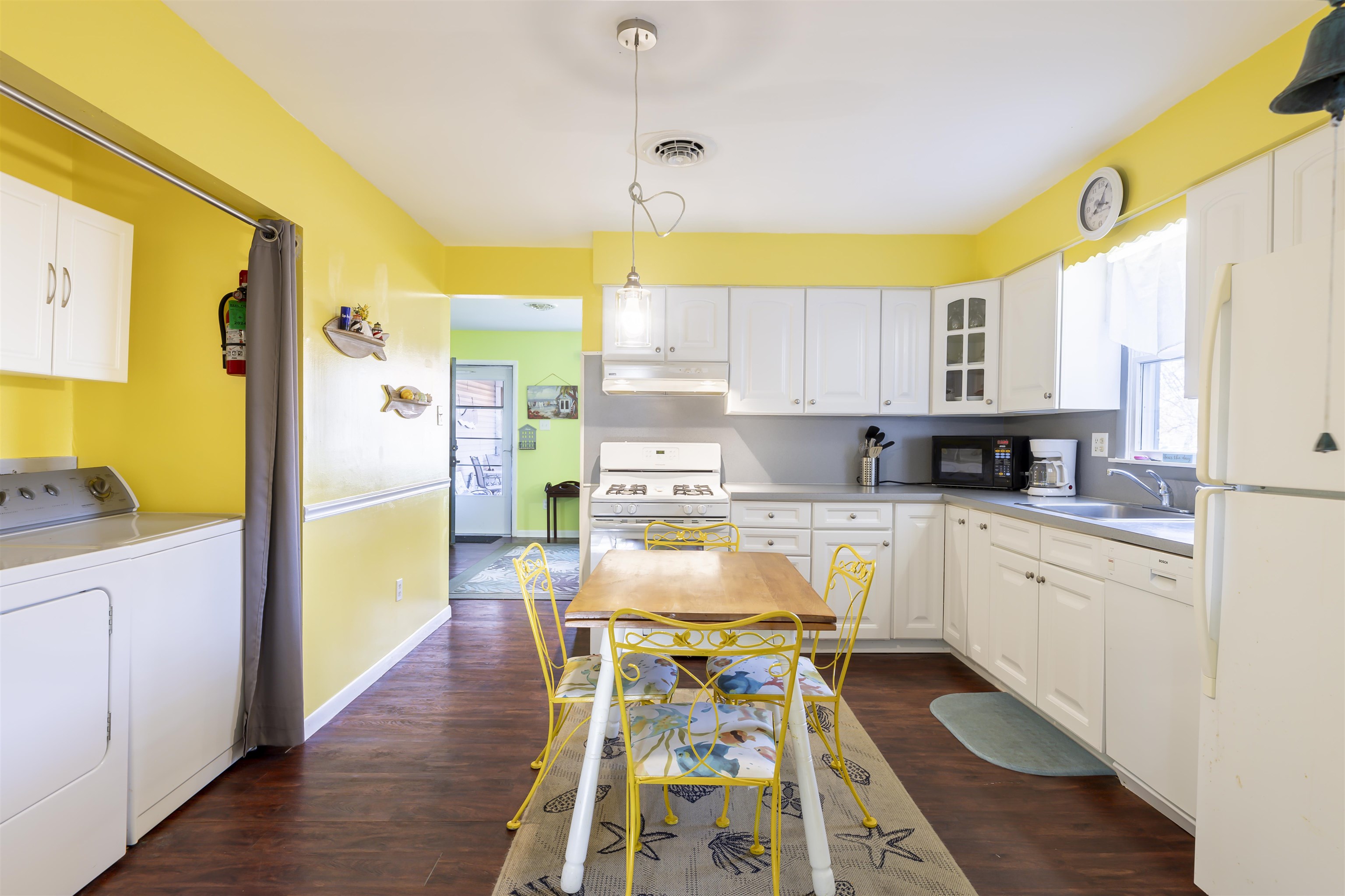 116 Cedardale Avenue Villas, NJ 08251 - Photo 11 of 30 a kitchen with stainless steel appliances granite countertop a stove a sink and a refrigerator