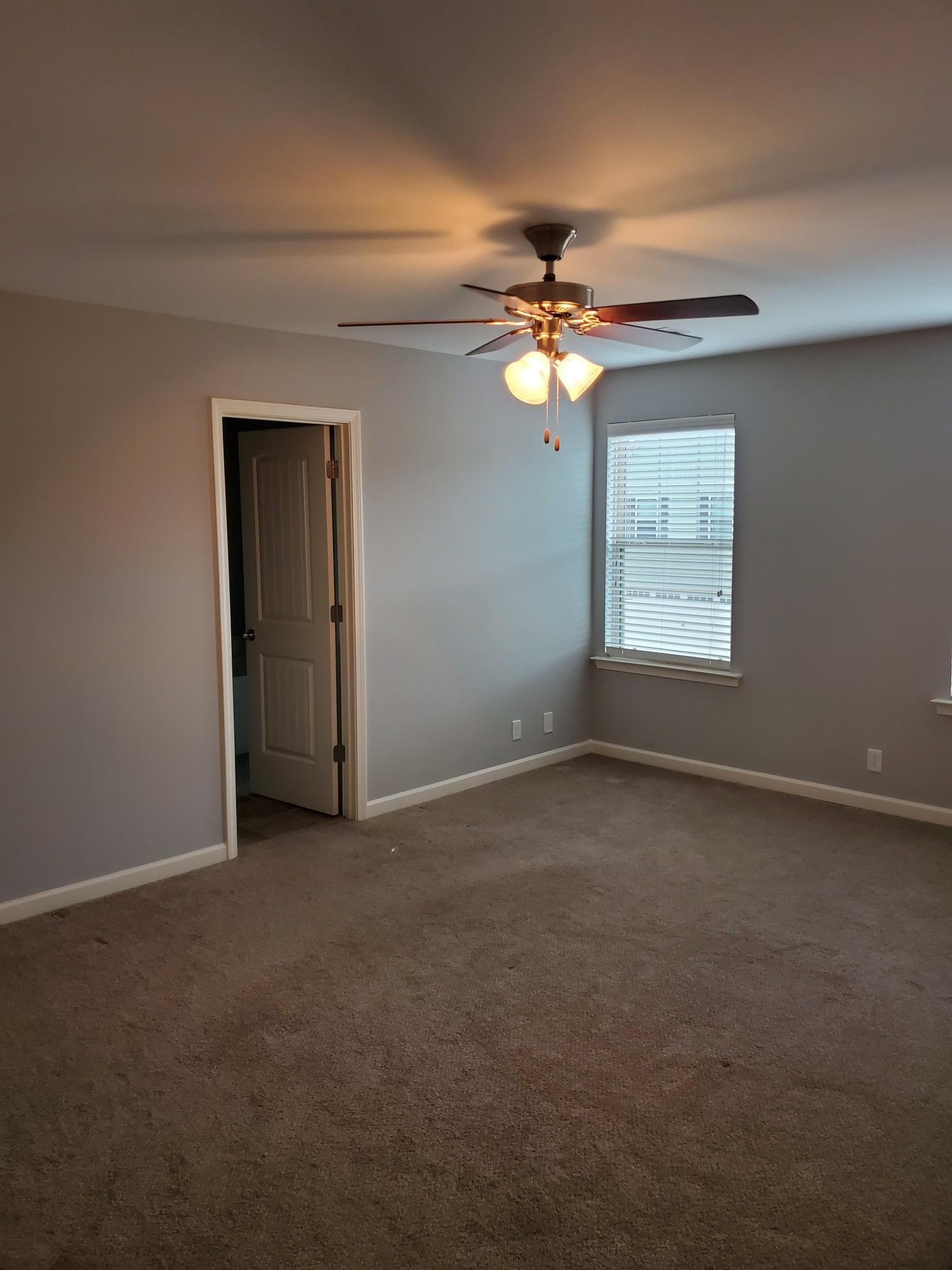 4417 Sunday Silence Way Murfreesboro, TN 37128 - Photo 8 of 17 an empty room with windows and fan