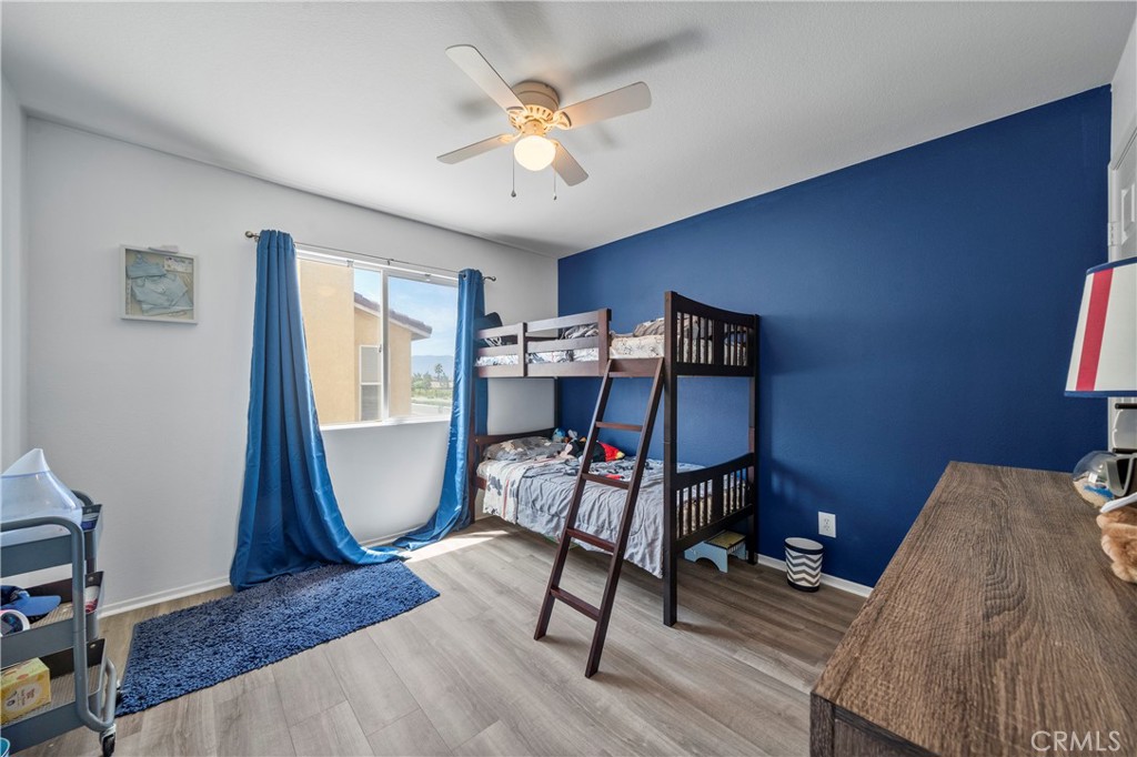 7441 Clementine Drive Eastvale, CA 92880 - Photo 23 of 39 a view of a workspace with furniture and a window
