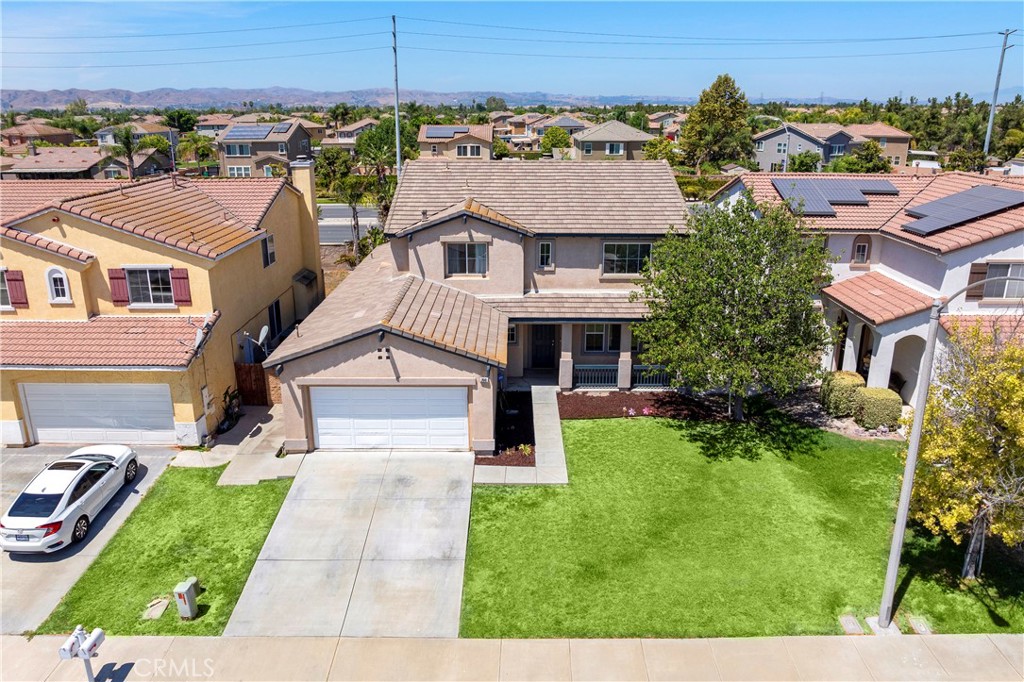 7441 Clementine Drive Eastvale, CA 92880 - Photo 37 of 39 a aerial view of a house with a yard