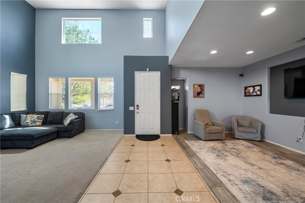 7441 Clementine Drive Eastvale, CA 92880 - Photo 5 of 39 a living room with furniture