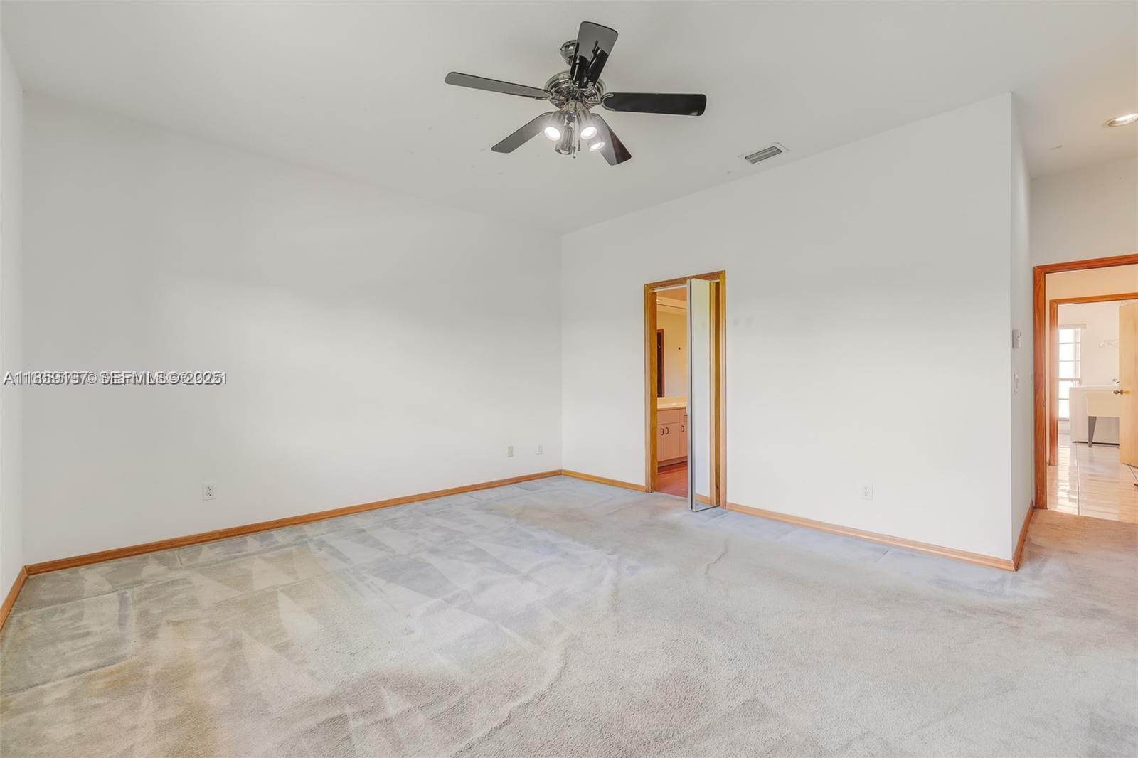 19900 Southwest 326th Street Homestead, FL 33030 - Photo 6 of 15 a view of an empty room