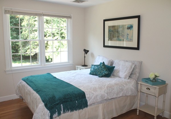 23 Wyman Road Lexington, MA 02420 - Photo 17 of 30 a bedroom with a large bed and a window