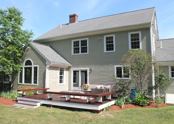 23 Wyman Road Lexington, MA 02420 - Photo 28 of 30 a swimming pool with outdoor seating and yard