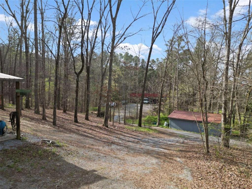 5948 Haywood Valley Road Summerville, GA 30747 - Photo 39 of 74 a backyard of a house with lots of green space