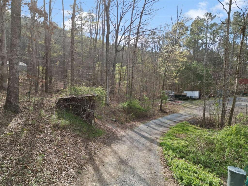5948 Haywood Valley Road Summerville, GA 30747 - Photo 40 of 74 a backyard of a house with lots of green space
