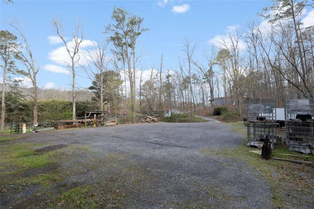 5948 Haywood Valley Road Summerville, GA 30747 - Photo 43 of 74 a view of a yard with a table and chairs