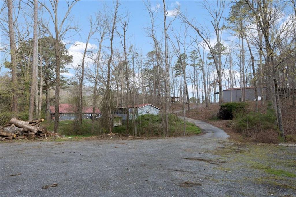 5948 Haywood Valley Road Summerville, GA 30747 - Photo 44 of 74 a backyard of apartments with large trees