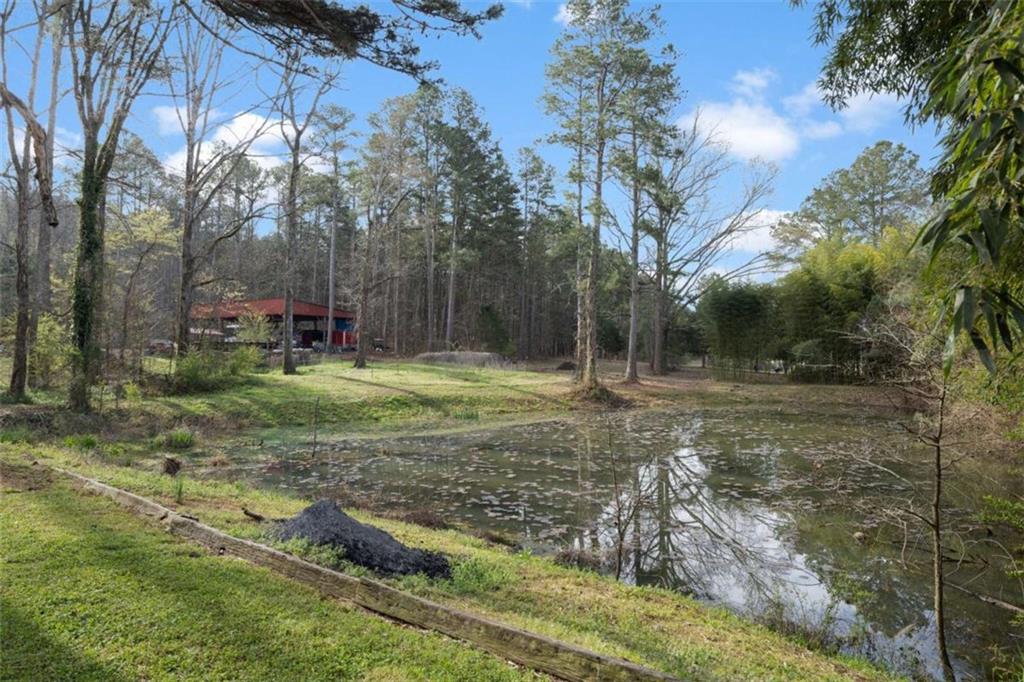 5948 Haywood Valley Road Summerville, GA 30747 - Photo 54 of 74 a backyard of a house with lots of green space
