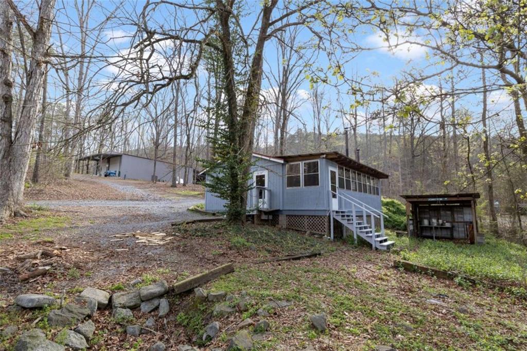 5948 Haywood Valley Road Summerville, GA 30747 - Photo 55 of 74 a view of a house with a yard