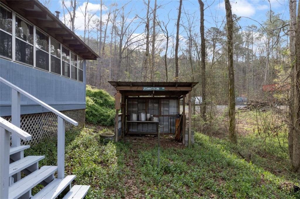 5948 Haywood Valley Road Summerville, GA 30747 - Photo 56 of 74 a view of backyard with barbeque grill and outdoor seating