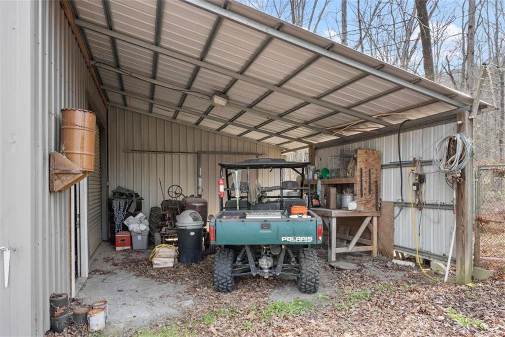5948 Haywood Valley Road Summerville, GA 30747 - Photo 66 of 74 a view of a chairs and table in backyard