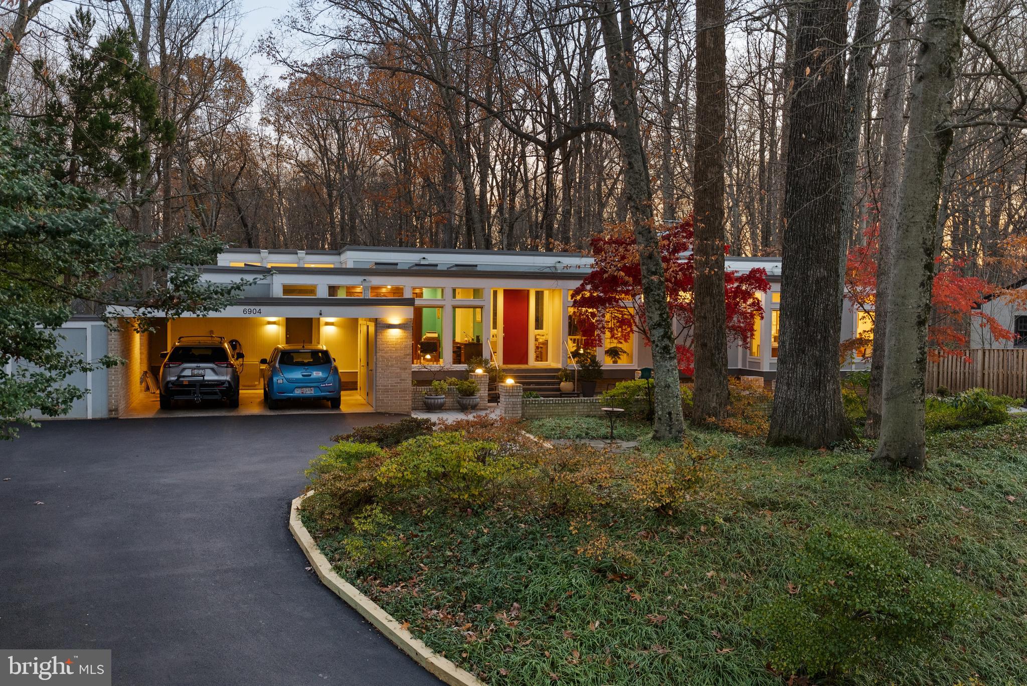6904 Carmichael Avenue Bethesda, MD 20817 - Photo 2 of 16 a view of a house with backyard and sitting area
