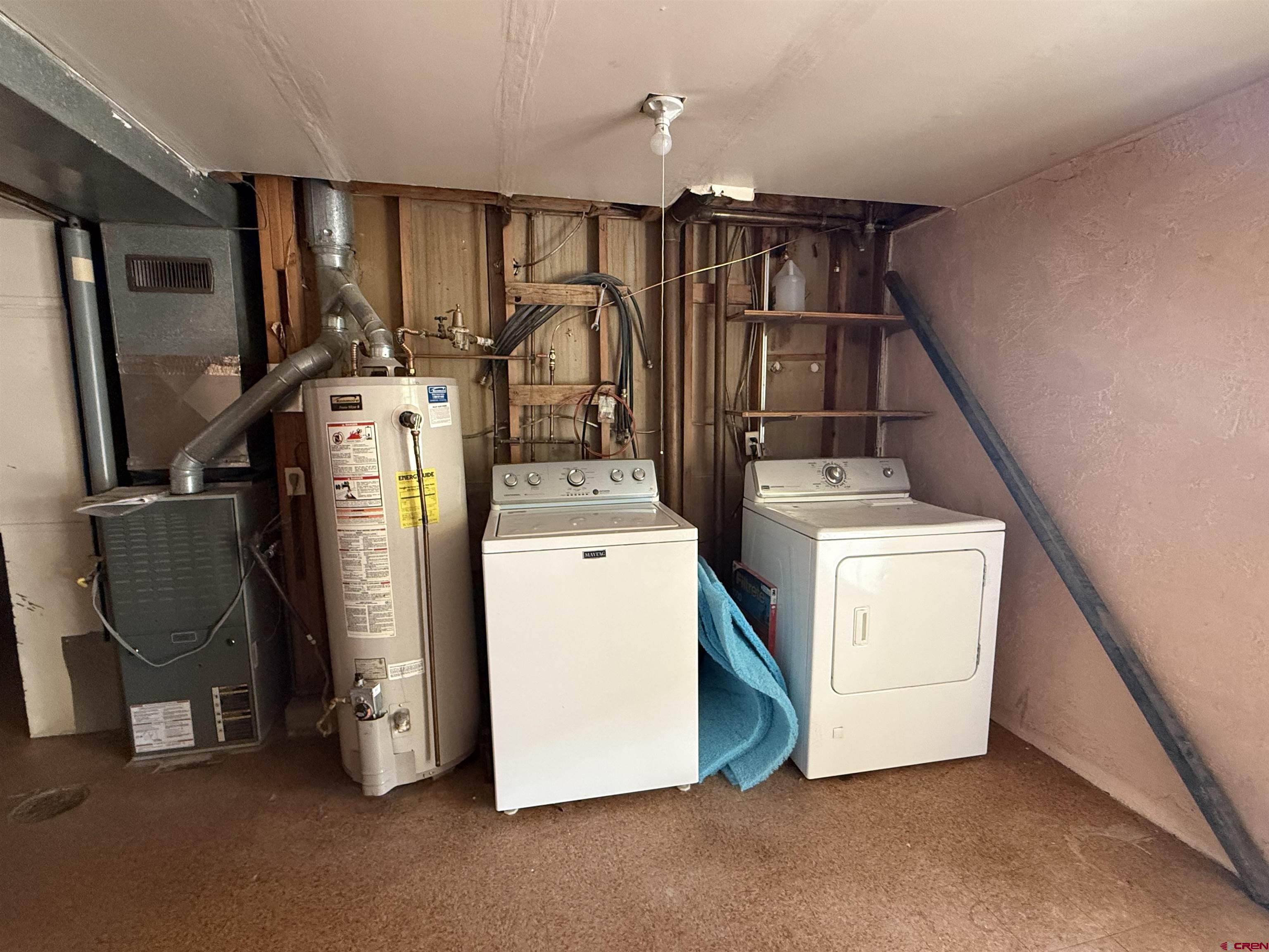 418 South Valley Road Cortez, CO 81321 - Photo 20 of 32 a utility room with dryer and washer
