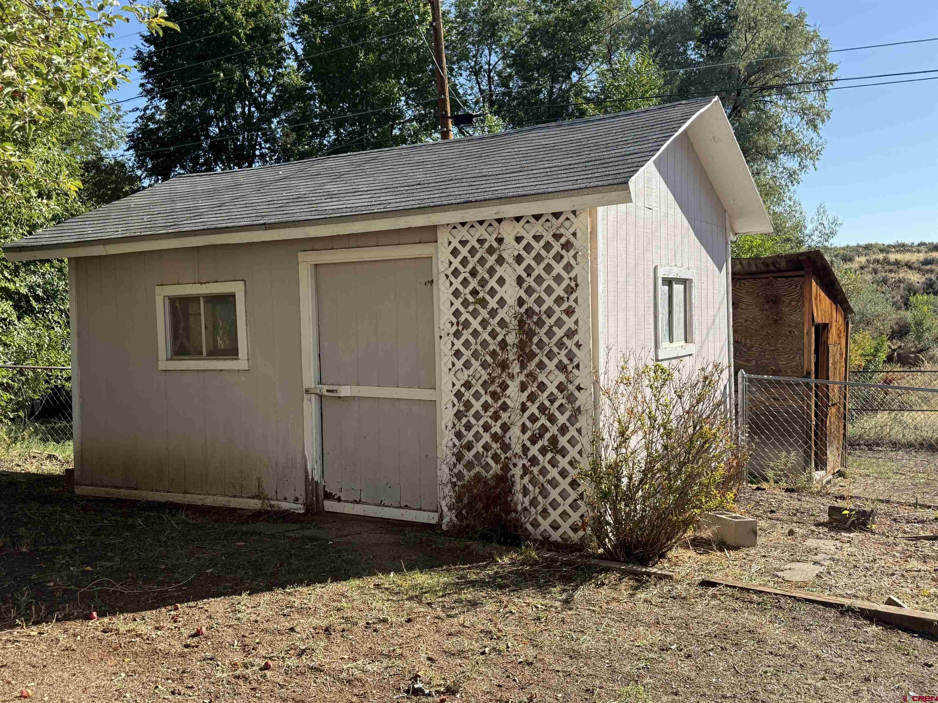 418 South Valley Road Cortez, CO 81321 - Photo 23 of 32 a view of a house with backyard