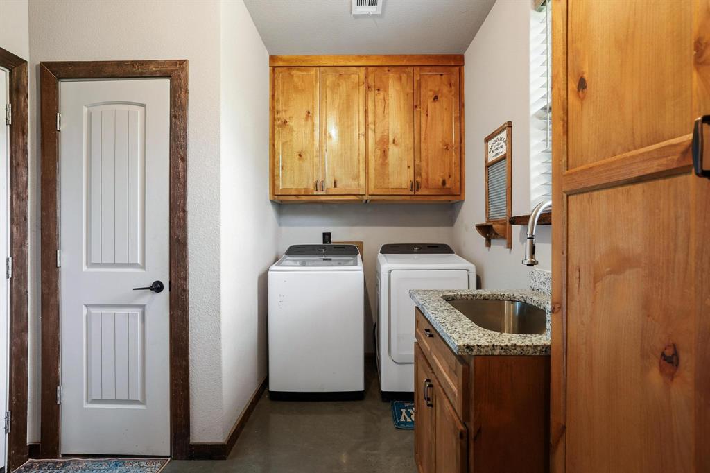 1900 County Road 1535 Bonham, TX 75418 - Photo 24 of 37 a utility room with dryer and washer