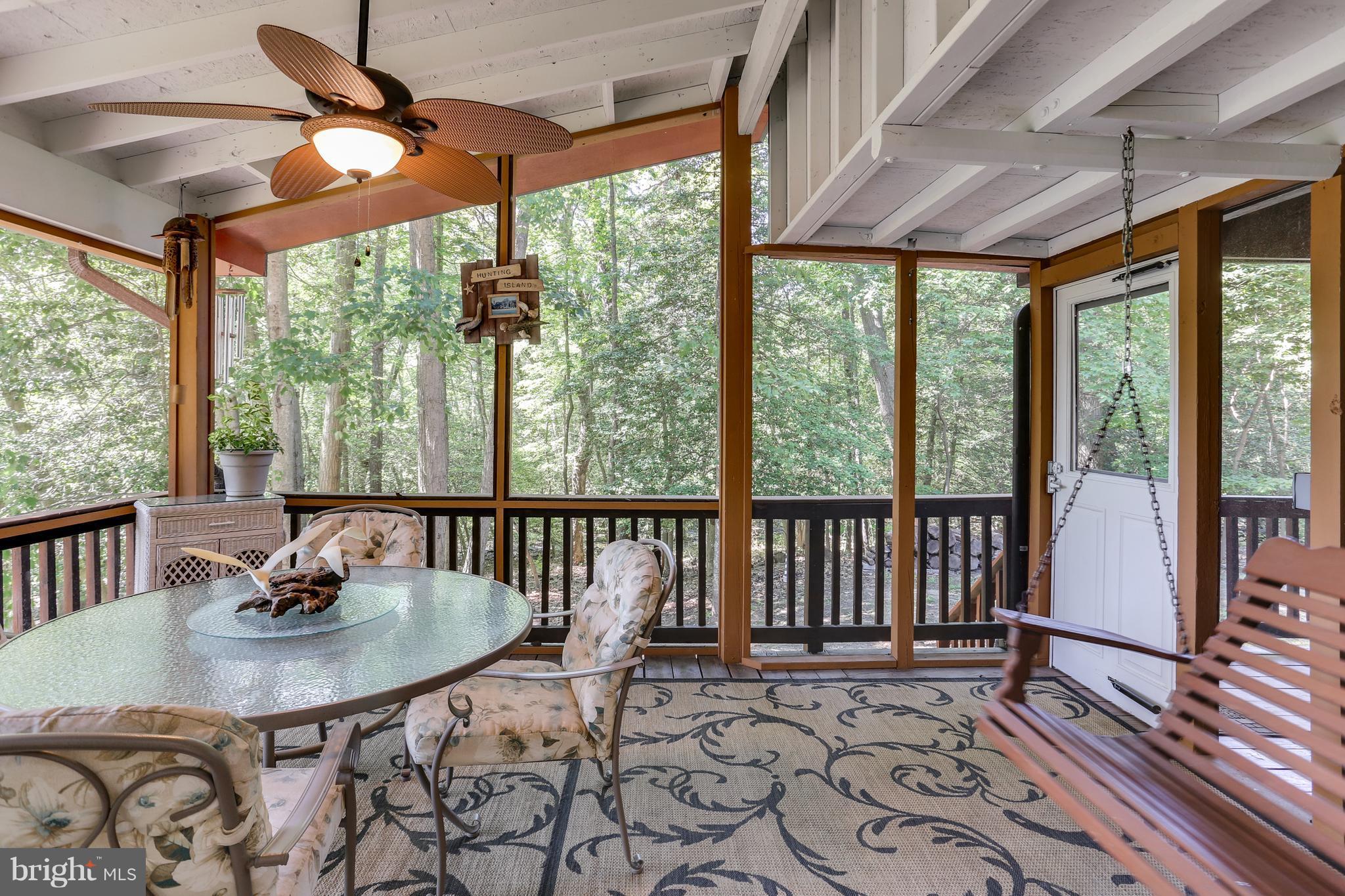 190 Hickory Point Road Pasadena, MD 21122 - Photo 8 of 30 Screened in porch off of family room