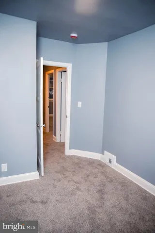 an empty room with closet