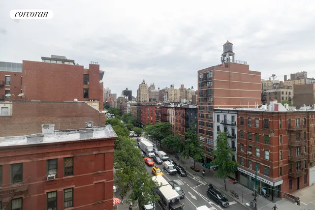 a view of city with tall buildings
