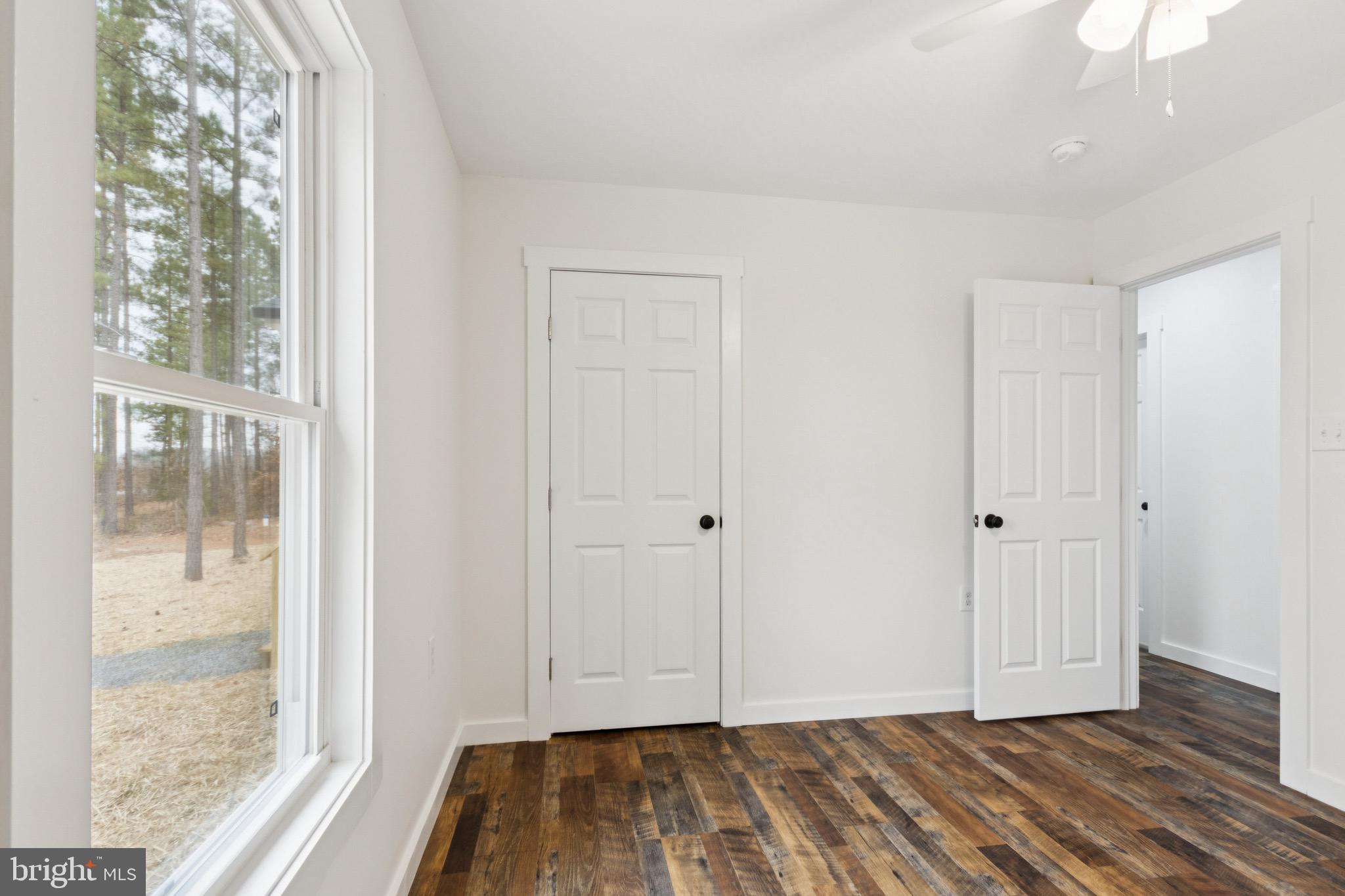 15281 Shirley Road Unionville, VA 22567 - Photo 11 of 24 a view of hallway with closet and wooden floor