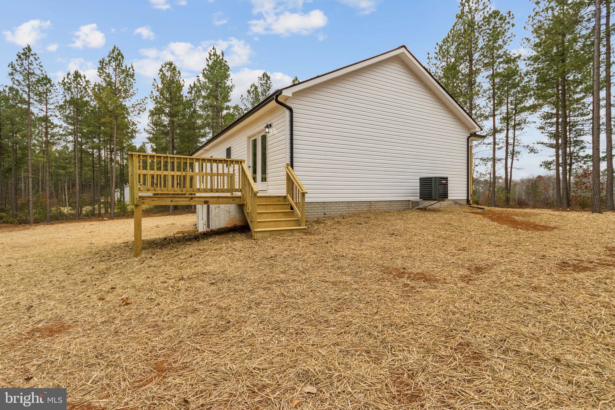15281 Shirley Road Unionville, VA 22567 - Photo 2 of 24 a view of a house with a yard