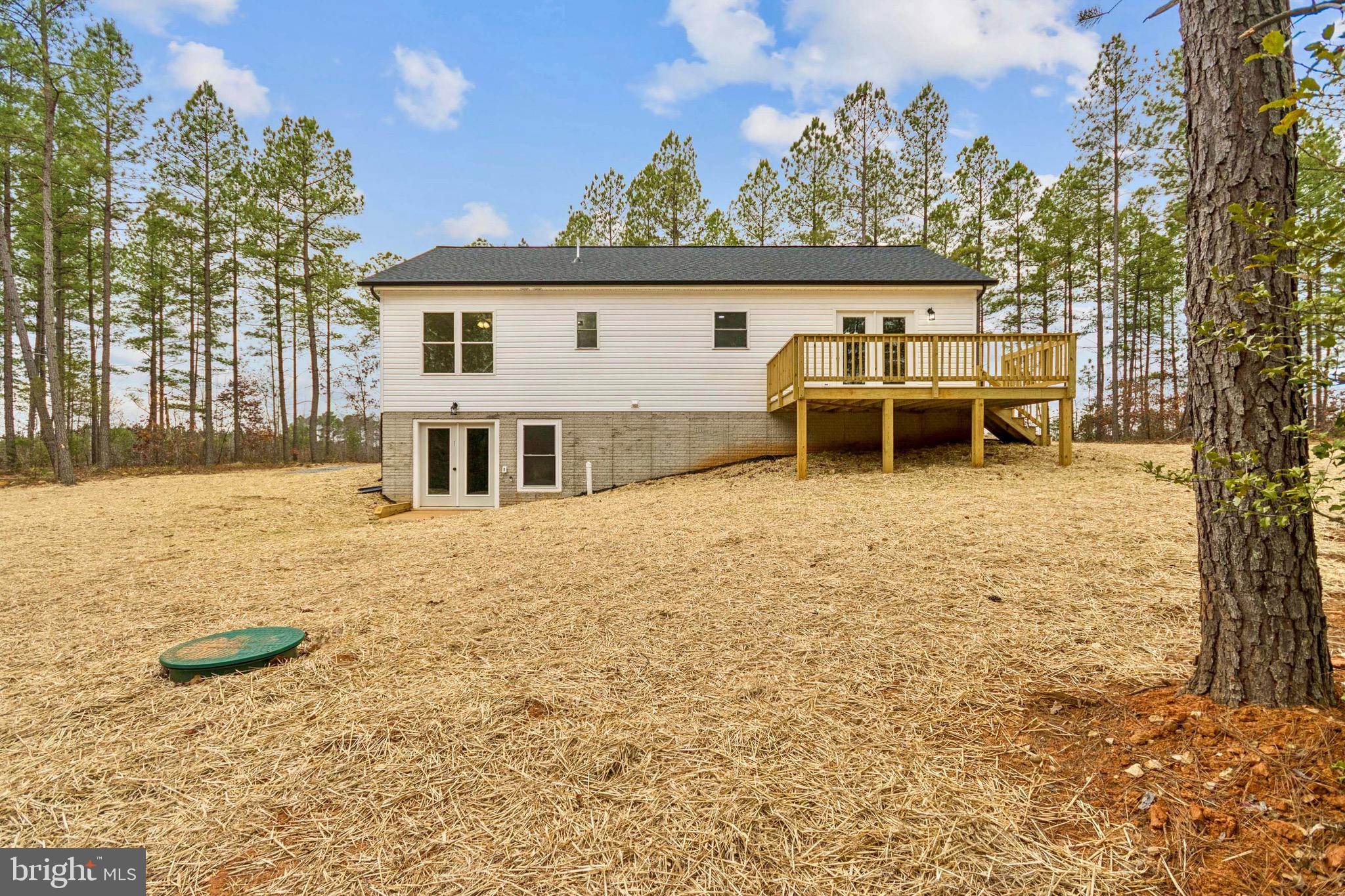 15281 Shirley Road Unionville, VA 22567 - Photo 7 of 24 front view of a house with a yard