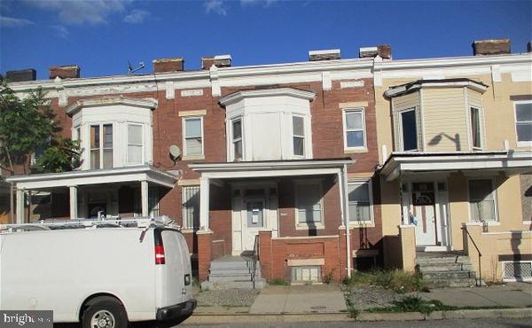 1215 Poplar Grove Street Baltimore, MD 21216 - Photo 1 of 4 a view of a large white building