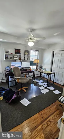 a bathroom with a sink toilet and mirror