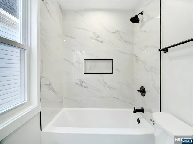 a bathroom with a bathtub