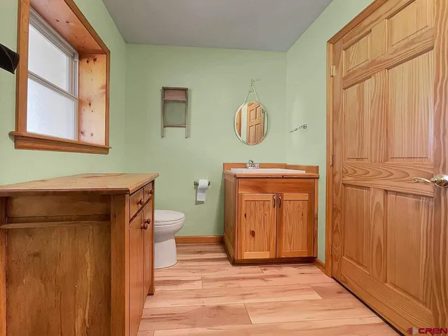 a bathroom with a toilet and a sink