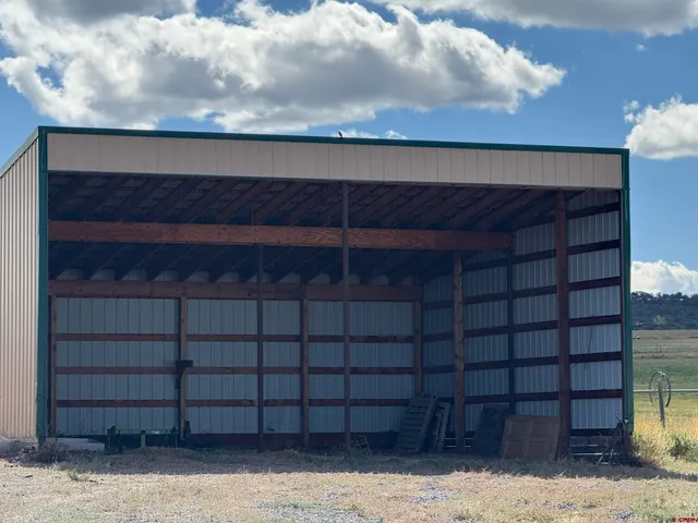 a view of a building with sitting area