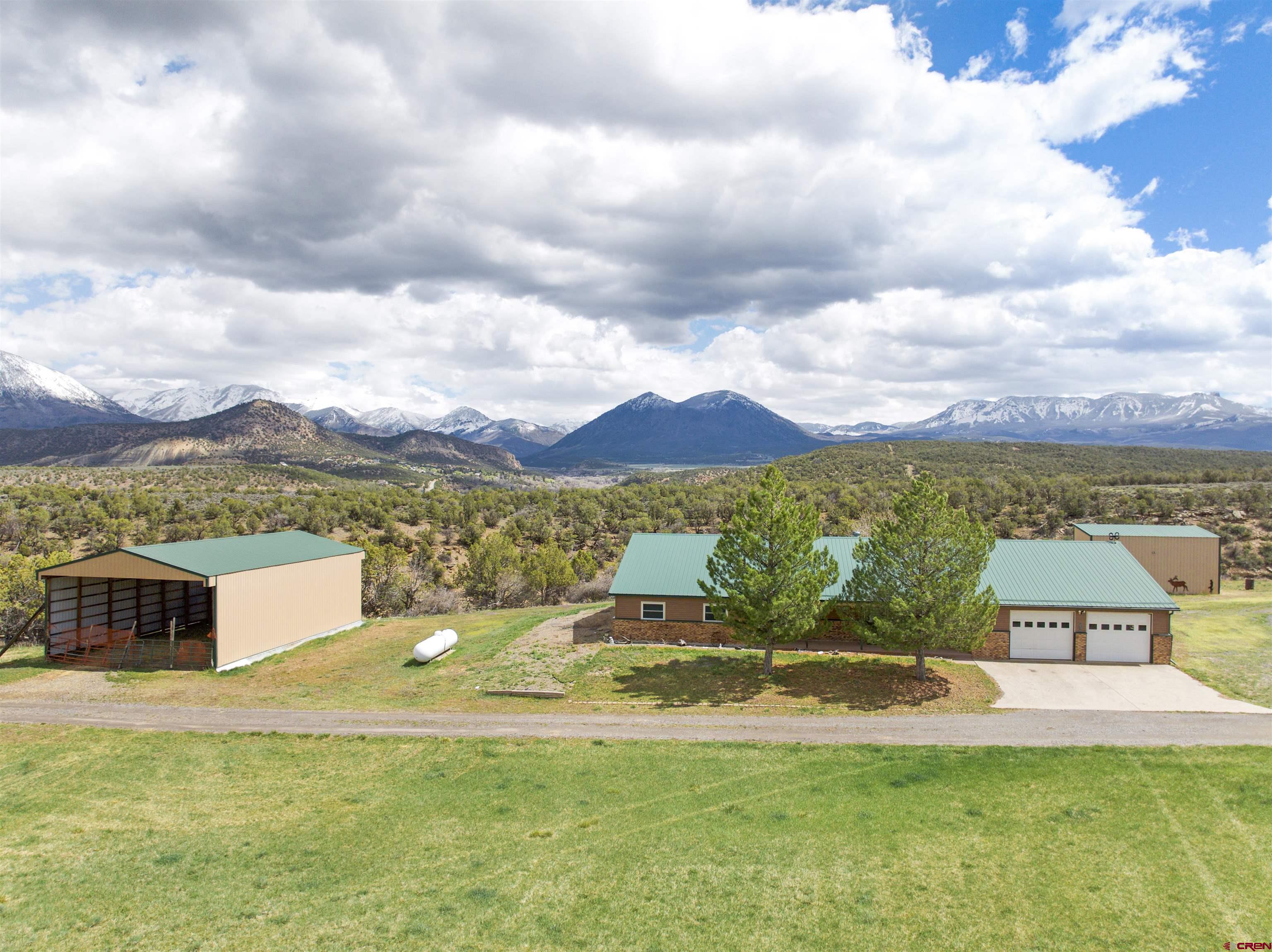 38832 Fruitland Mesa Road Crawford, CO 81415 - Photo 5 of 41 a view of a city with an ocean view