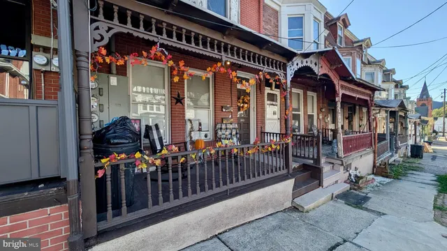 a view of street with sitting area