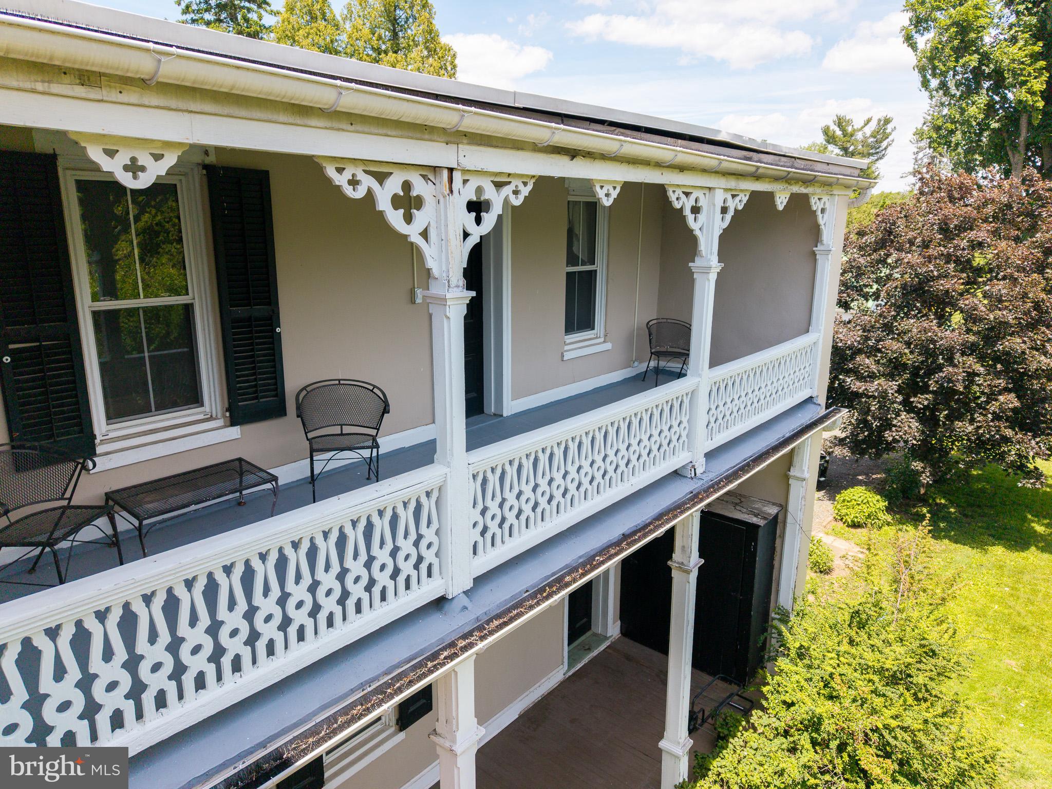 225 Niantic Road Barto, PA 19504 - Photo 13 of 82 a view of balcony with wooden deck and outdoor seating