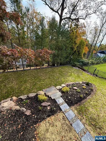 a view of a road with a yard