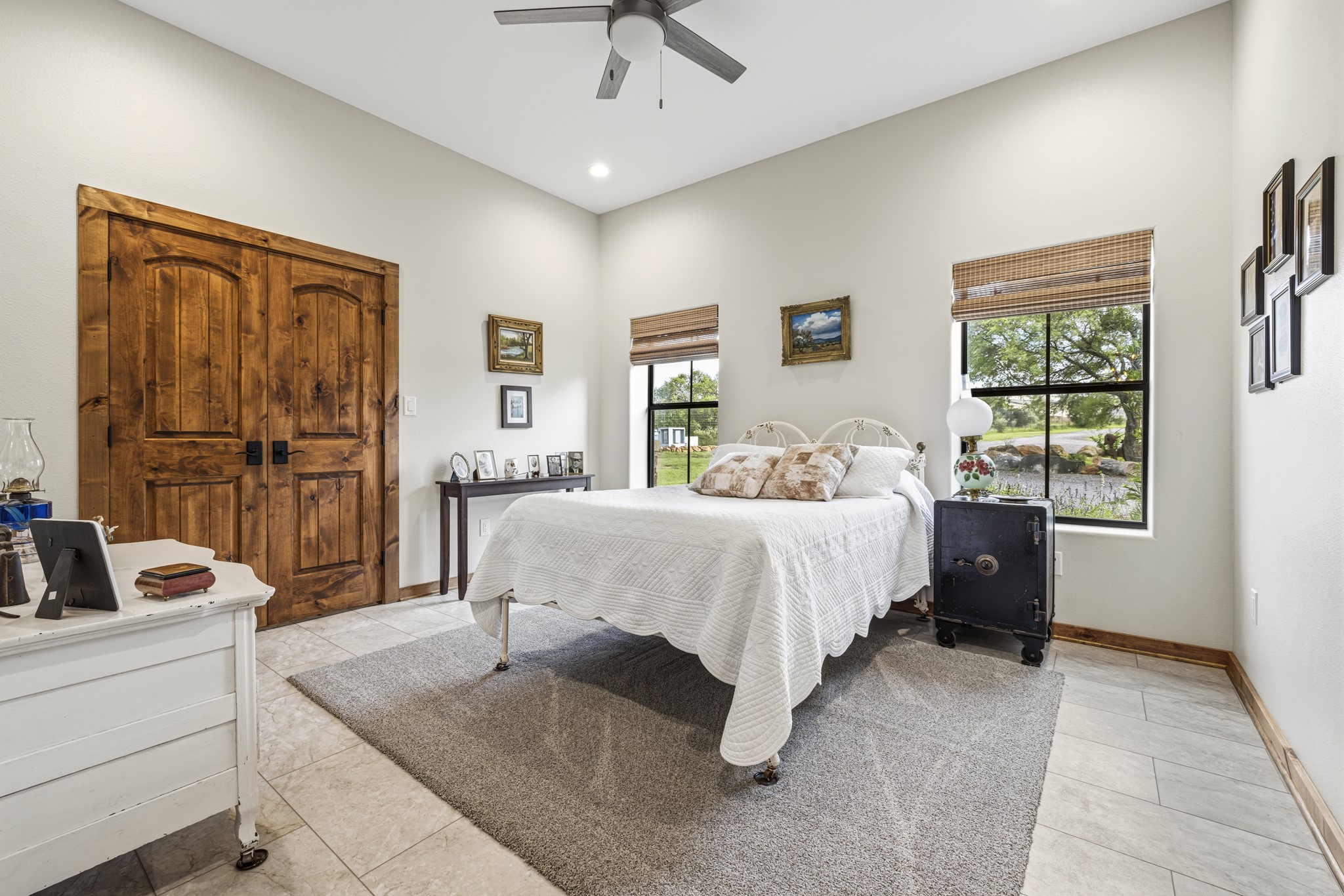 3724 Ranch Road 3347 Round Mountain, TX 78663 - Photo 12 of 40 a bedroom with a bed and a large window