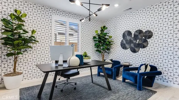 a work room with furniture