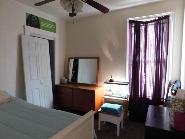 512 North 9th Street Rochelle, IL 61068 - Photo 8 of 14 a room with furniture and a window